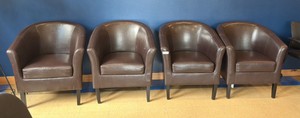 4 leather chairs, 2 with minor damage (Lobby)