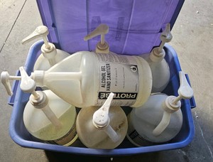 jugs of hand sanitizer  (r140)