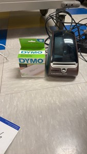 dymo labeler with new box CML of labels