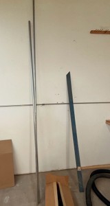 Electrical Conduit (metal conduit pipe) & framing piece.
