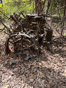 LARGE cast iron farming equipment.