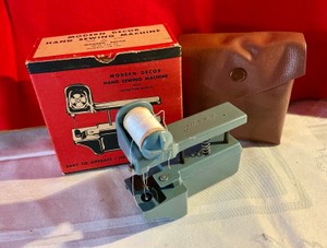 Vintage modern decor hand sewing machine with original container and box