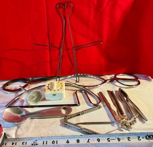 Vintage various kitchen utensils and pan lid holder