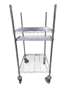 Estimated new retail $300$500.Pre owned Metal Wire Rolling Cart With 3 Shelves  55 x 30 x 2