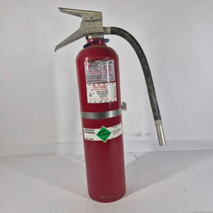 Red Fire Extinguisher with Hose and Nozzle