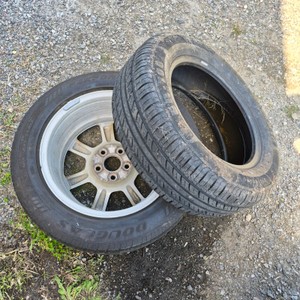 2 Tires on Aluminum Wheels Douglas and Multi-Mile