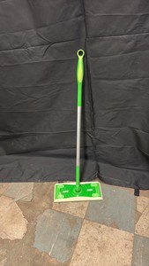 Swiffer, Green Color, Two Feet High, Does Not Come With Cleaning Pads