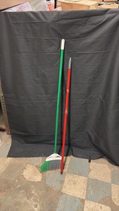 Green Broom With Extra Red Handle