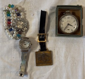 Three Vintage Watches and a Watch band