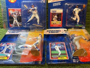 Mixed Lot of 4 Starting Lineups 1995 SLU Nomar Beuerlein Raines Delgado MIP Baseball QUANTITY1
