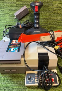 Original NES System with cords- Tested & Works, 1 Controller, 1 Gun, 1 Mario & Duck Hunt !