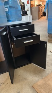 Wooden Shelf and Drawers, Black Color with Silver Colored Metal Handles, Middle Shelf Opens and Closes, 3 Drawers on Right Side and Two Shelves on Left Side