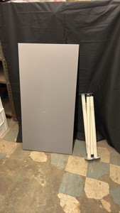 Heavy Duty Gray Wooden Table with Metal Lega, Comes With Original Screws to Mount the Legs, The Screws are Taped to the Underside of the Table so They Dont Get Lost, Great for Office, Shops, Businesses or Home Use, Dent in the Top of the Table
