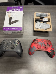 2 Xbox controllers and a WiFi USB adapter
