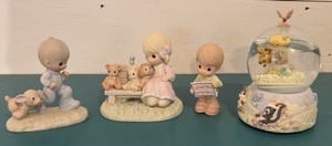 Four Precious Moments Figurines