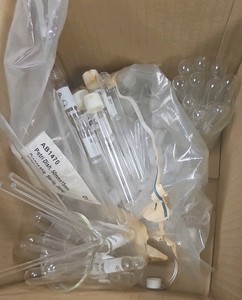 box of assorted test tubes