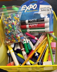 basket of markers, dry erase markers, thumbtacks