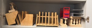 shelf of test tube holders, 11 various in lot