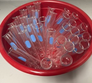 shelf of bottles and test tubes