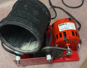 Small tumbler and box of rocks
