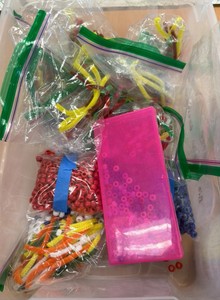 pipe cleaners, beads, bows and paper clips