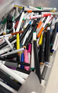 large bucket of markers