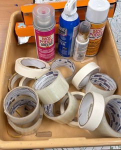 lot of tape, aluminum foil and clear acrylic