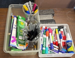 dry erasers, dry erase markers, pencils and Sharpies