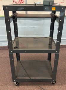 rack with wheels and power strip