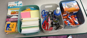 A lot of index cards, Post - It notes, scissors, glue sticks