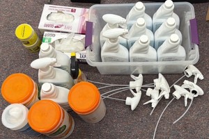 lot of open cleaning supplies