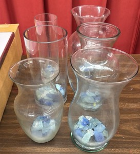 A lot of vases with rocks