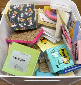 Bin of Post It notes