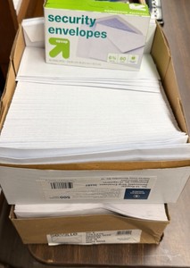 three boxes of envelopes
