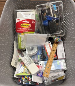 Bin of tacks, staples, tape, pencils, sharpeners, pencil lead, rulers, key tags, pushpins and paper clips