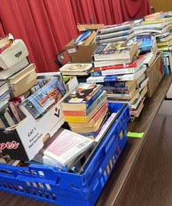 A lot of any 50 books from table