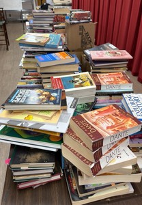 A lot of any 50 books from table