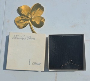 This is a Vintage Gerity 24K Gold Electroplated Four-Leaf Clover Paperweight,