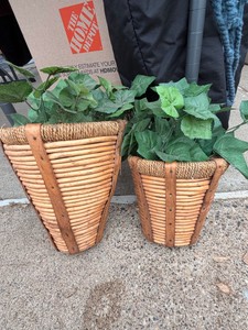 2 Wicker Basket and faux plants.