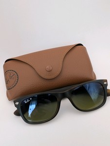 Ray-Ban New Wayfarer sunglasses in a classic tortoise shell pattern