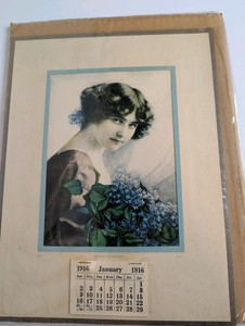 Vintage 1916 Spring Flowers calendar lithograph featuring a portrait of a woman
