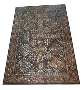 H - Patterned Area Rug 63 X 90 in