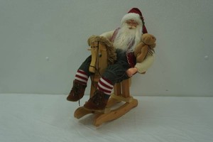 Wooden Santa Doll Figurine on Rocking Horse