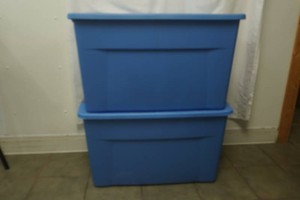 2 Large Totes With Lids. 33 Gallon