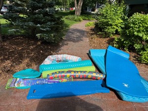 Large Variety of Pool Toys and Floaties Including Brands of Frontgate and others