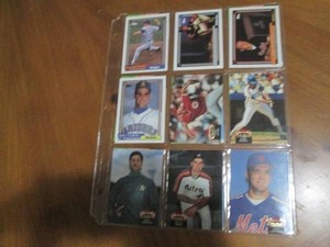 Double Sided Page of Assorted Baseball Trading Cards in Plastic Sleeve