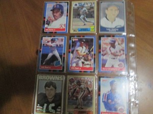 Double sided page of sports cards f...