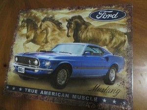 Ford metal sign, measures 12 x 16...