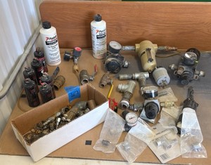 Air tool regulators and plumbing parts