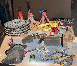 Hub caps, car jacks, rachet straps, trailer hitch, screw drivers  more